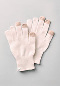 A pair of Woolx Asher Tech Gloves in Almost Mauve Merino wool, with light brown touchscreen tips on thumb, index, and middle fingers, laid flat on a light gray background.