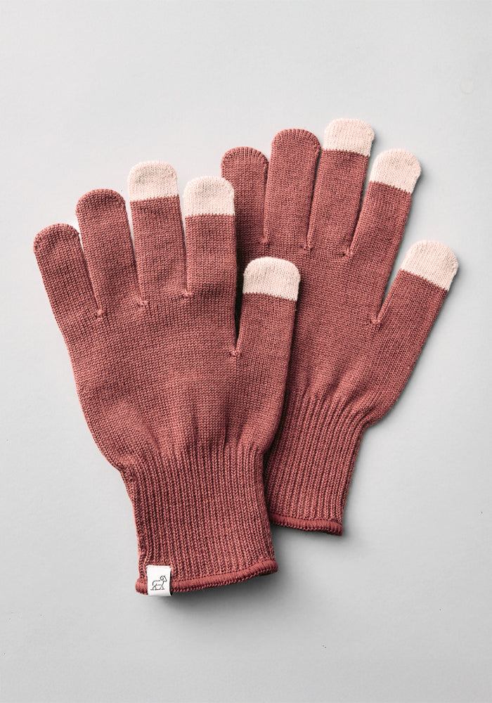 Woolx Asher Tech Gloves - Wild Ginger: women's mauve merino wool gloves with light pink tech fingertips on the thumb, index, and middle fingers, shown on a light gray background.