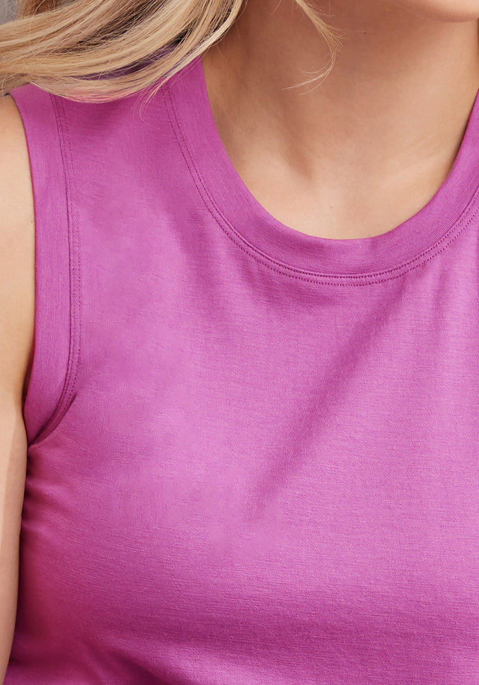Close-up of a person in the Woolx Bella Tunic Top • Final Sale - Purple Wine, showing shoulder, neck, and blonde hair.