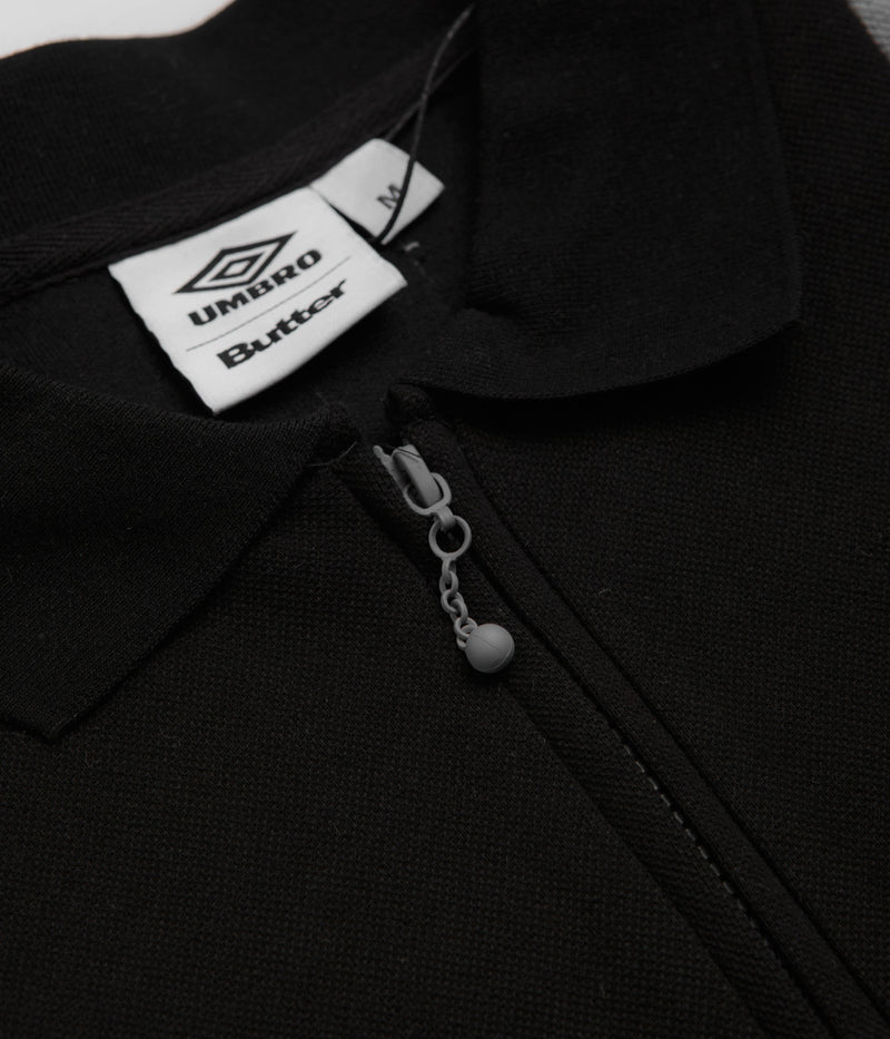 Butter Goods x Umbro Athletica Polo Shirt in Black