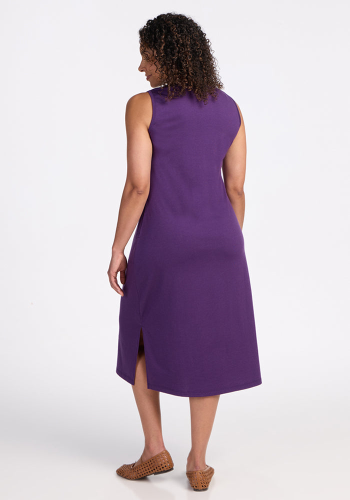 Person in the Woolx Cassie Dress in Plum Crush, sleeveless with a side slit, facing away from the camera.