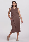 Woman wearing the Woolx Cassie Dress in Peppercorn, beige flats, and sunglasses on her head, smiling and posing. | Tiffany is 5’8”, wearing a size S