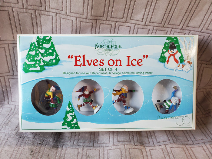 Department 56 North Pole Series "Elves on Ice" Set of 4 Figurine Set (2 SETS AVAILABLE PRICED INDIVIDUALLY AT $10 EACH)