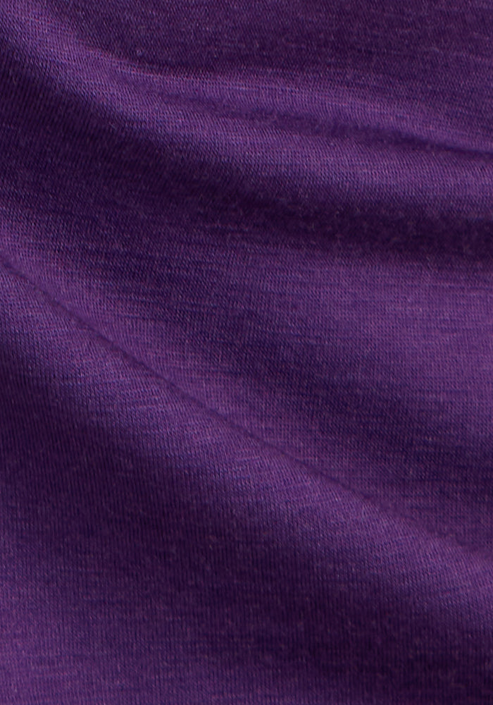 Close-up of the Woolx Elena 3/4 Sleeve V Neck in Plum Crush, showing its smooth merino wool texture and soft sheen.