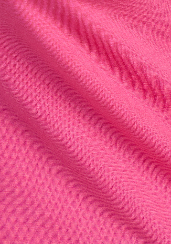 Close-up of Woolx Elena 3/4 Sleeve V Neck • Final Sale - Raspberry Fizz fabric with visible texture and folds.