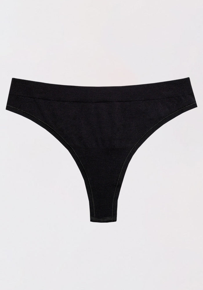 The Woolx Farrah Thong, made from black Merino wool, is shown against a white background, providing a seamless and moisture-wicking underwear option.