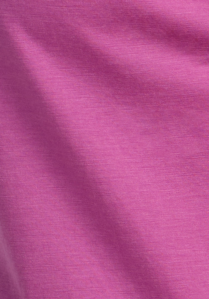 Close-up of the Woolx Hazel Tunic in Purple Wine, showing smooth, moisture-wicking fabric with gentle folds.