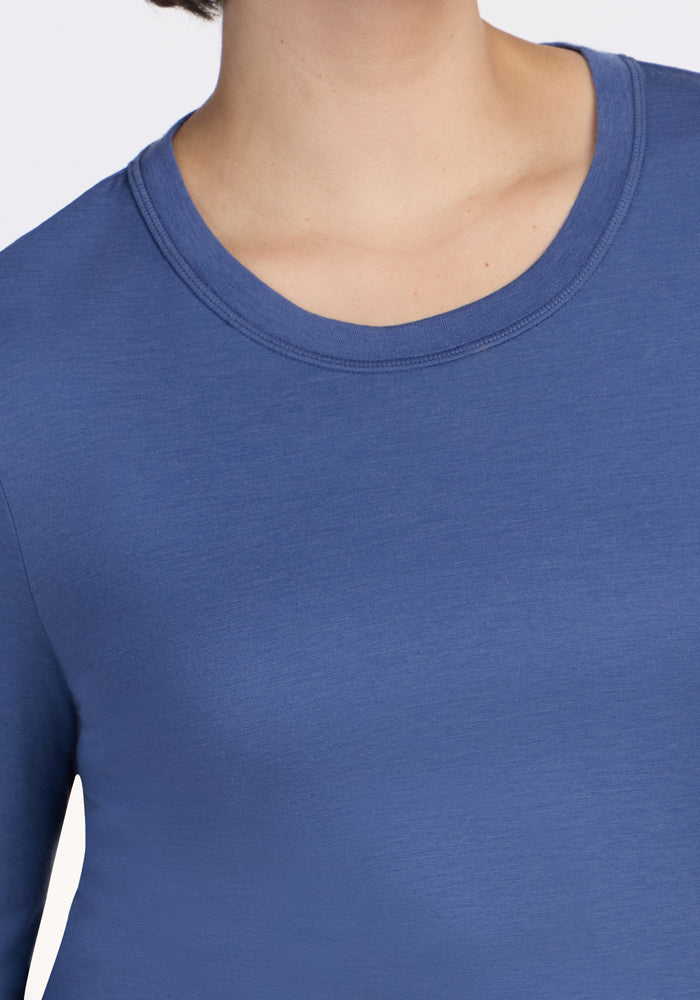 A person wearing the Woolx Hazel Tunic in Skyline, shown from shoulders to upper chest. Final sale item.