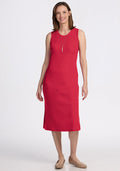 Woman in a Woolx Iris Ribbed Dress - Berry Ice Pop, smiling in beige flats against a white background. | Jessica is 5’10”, wearing a size S