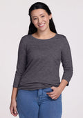Woman with long dark hair wears a Woolx Jenny 3/4 Sleeve Crew Neck in Cinder Melange, smiling in blue jeans.