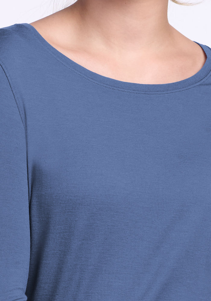 Close-up of a person wearing the Woolx Jenny 3/4 Sleeve Crew Neck in Skyline, highlighting neckline and upper chest.