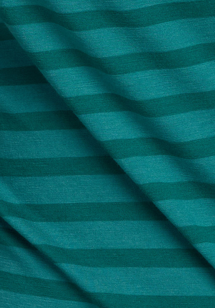 Woolx Junie V Neck in Woodland Stripe: teal Merino tee with dark stripes, gentle folds, and odor-resistant.