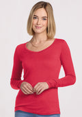 Blonde woman smiles wearing the Woolx Layla V Neck Top in Berry Ice Pop, with a plain light background. | Georgia is 5'10", wearing a size XS