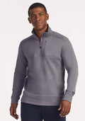 A man faces forward in a Woolx Mason 1/4 Zip • Final Sale - Arctic Dusk pullover and dark jeans, wearing a neutral expression against a plain white background.