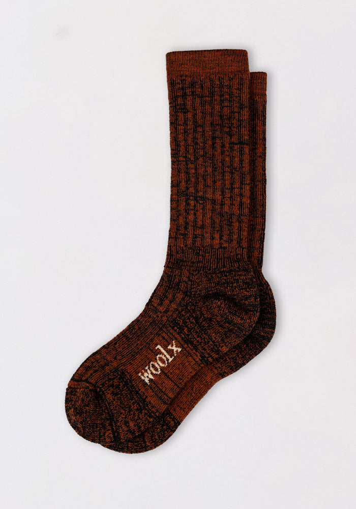 Woolx Mens Joey Mid Calf Socks in Cinnamon Spice feature ribbed maroon and black Merino wool with "YOOM" in white on the sole, designed for ultimate comfort and shown against a plain white background.