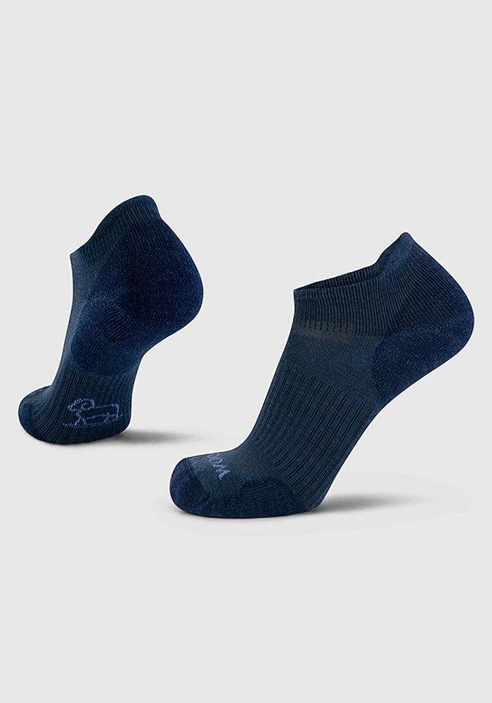 The Woolx Mens Rowan No Show Socks in Evening Tide are shown on a light gray background, with one sock facing forward and the other angled backward to highlight different views.