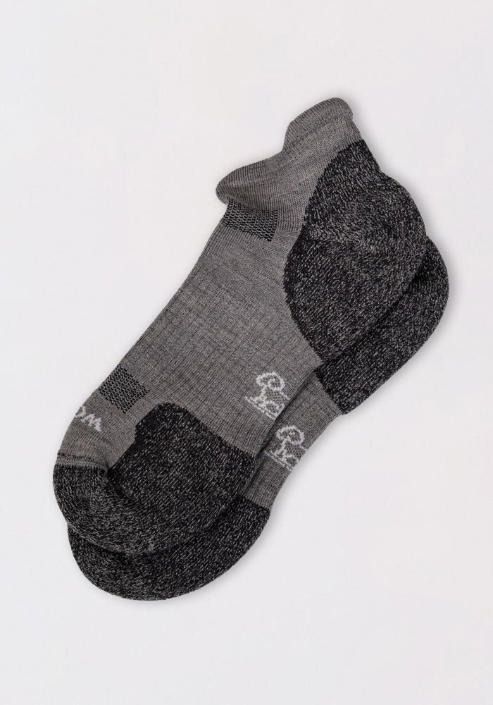 Woolx Mens Rowan No Show Socks in gray Merino wool feature dark gray heels and toes with a subtle white design near the toes, shown on a plain light background.