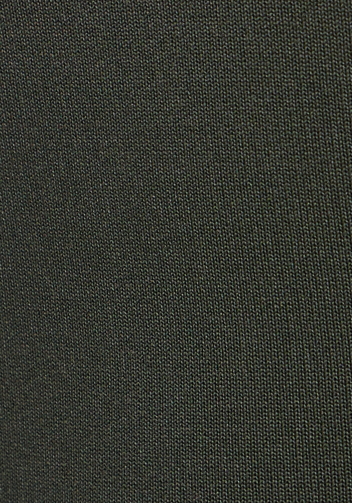 Close-up view of the Woolx Merino Flex® McKenna Petite - Everleaf fabric—a fine, even knit in dark gray with a soft, matte texture.