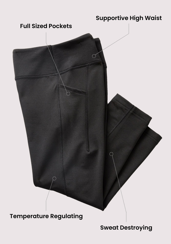 The Woolx MerinoFlex® McKenna Pocket Leggings in black feature full-sized side pockets, a supportive high waist, temperature-regulating Merino wool fabric, and advanced sweat-wicking properties.