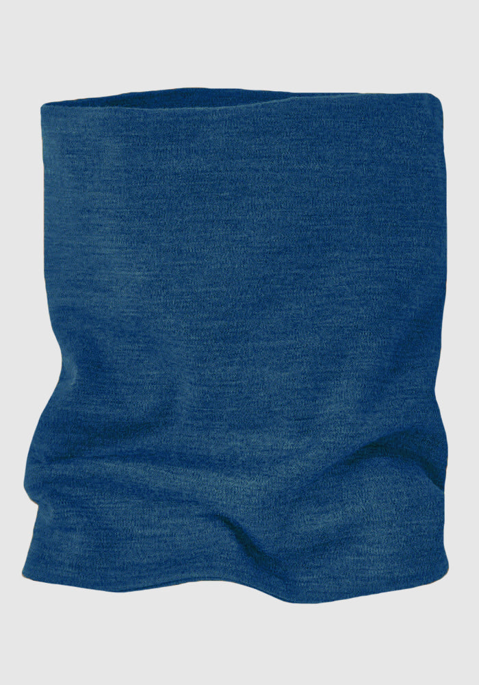 The Woolx Neck Gaiter • Final Sale - Majolica Blue is shown against a plain light background, highlighting its seamless Merino wool knit with a soft, stretchy texture and visible gentle creases.