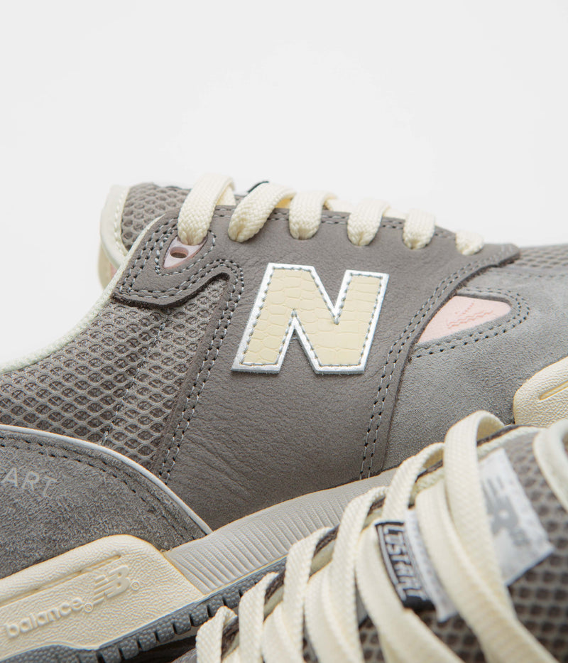 New Balance Numeric x Lost Art 600 Shoes in Sea Salt and Grey