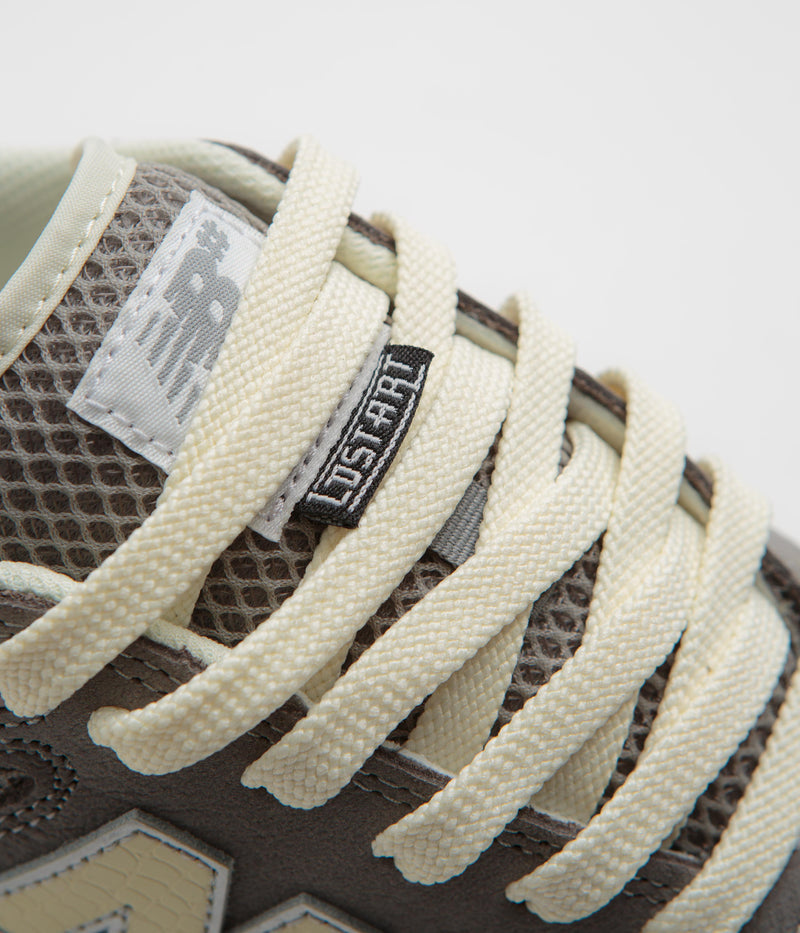 New Balance Numeric x Lost Art 600 Shoes in Sea Salt and Grey
