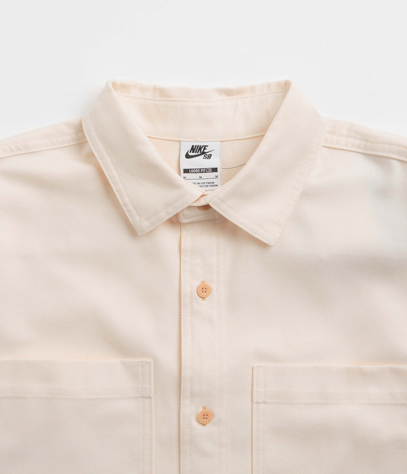 Nike SB New Essential Woven Shirt in Guava Ice and Neutral Olive