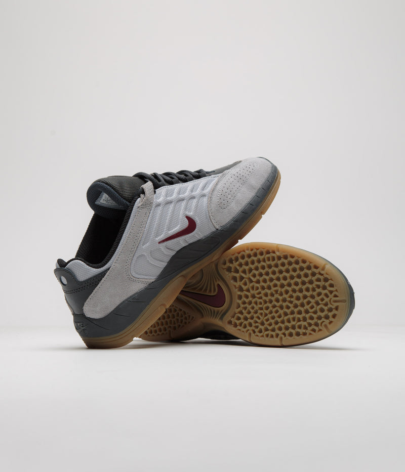 Nike SB Vertebrae Shoes in Light Smoke Grey and Dark Team Red