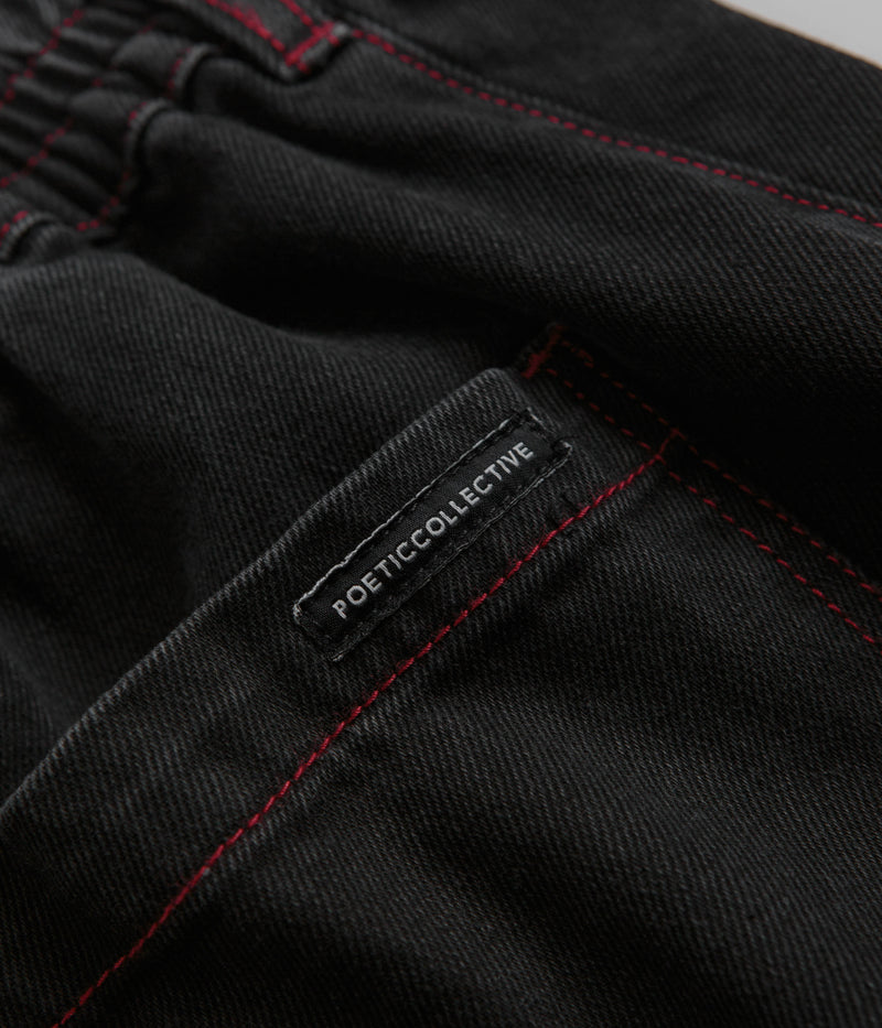Poetic Collective Denim Sculptor Pants in Black and Red Stitch