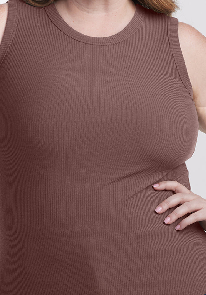 A person wears the Woolx Raegan Ribbed Tank Top in Peppercorn, with one hand resting on their hip.