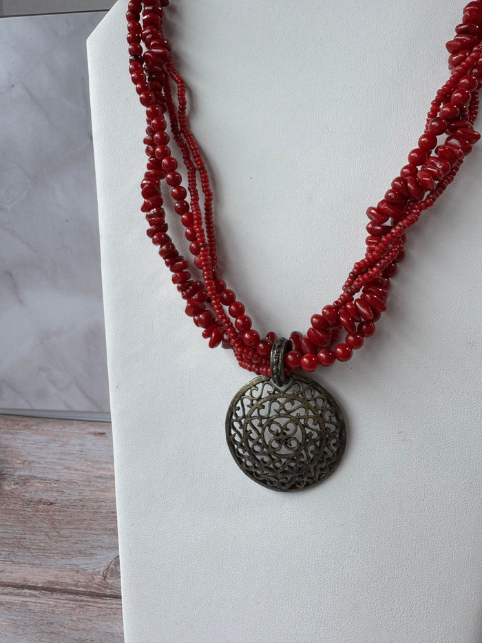 Red Beaded Torsade Necklace with Bronze Tone Filigree Pendant