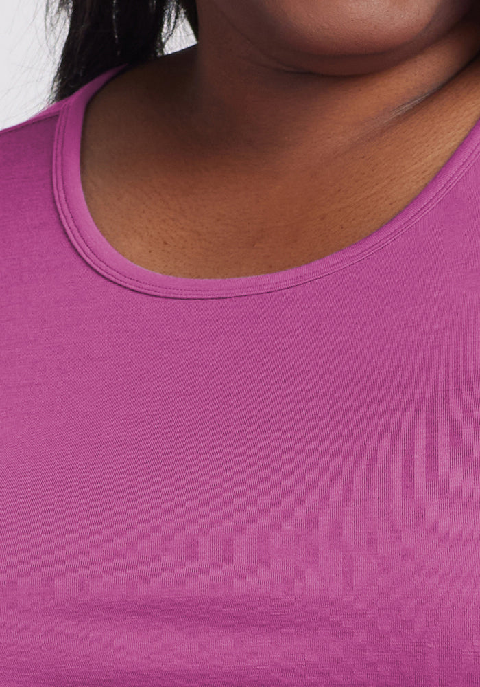Close-up of a person in the Woolx Remi Long Sleeve T-Shirt in Purple Wine, showing neck, shoulder, and chest.