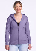 Smiling person in a Woolx Ryann Hoodie • Final Sale - Montana Grape, standing against a plain background.