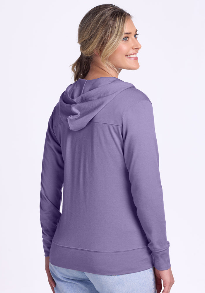 Blonde woman in a ponytail smiles while wearing the Woolx Ryann Hoodie in Montana Grape (Final Sale).