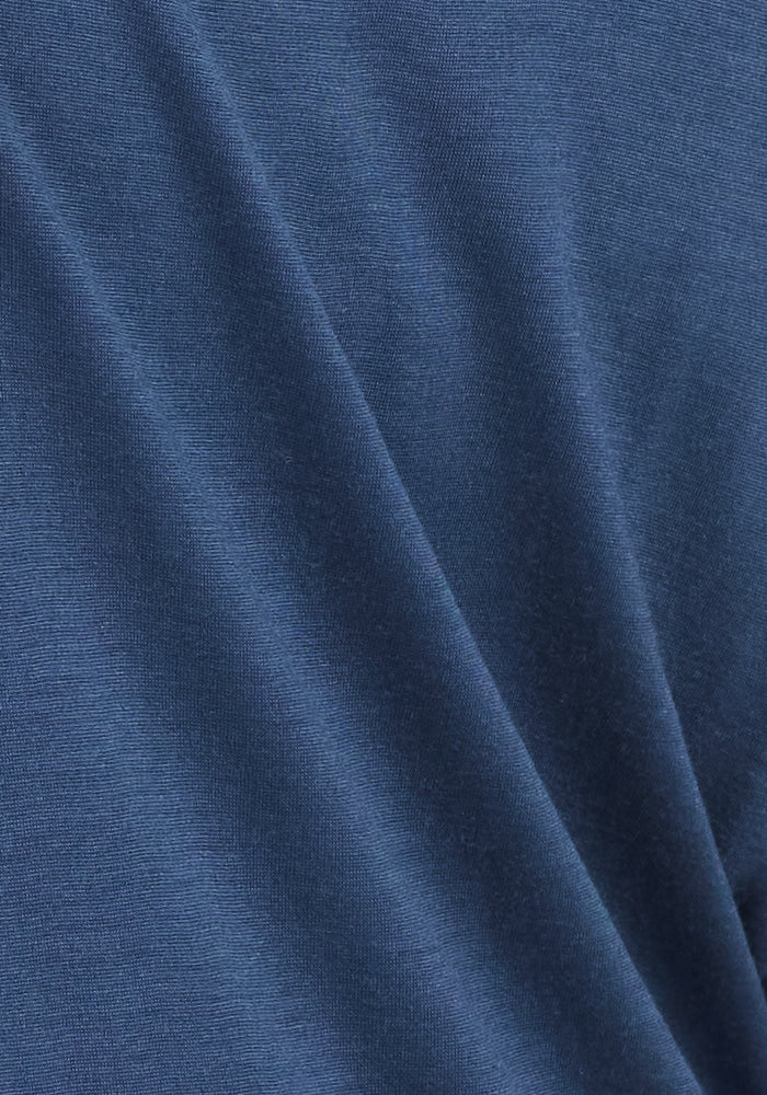 Close-up of smooth Starry Night Summit Polo fabric by Woolx, perfect for high-performance athletic wear.
