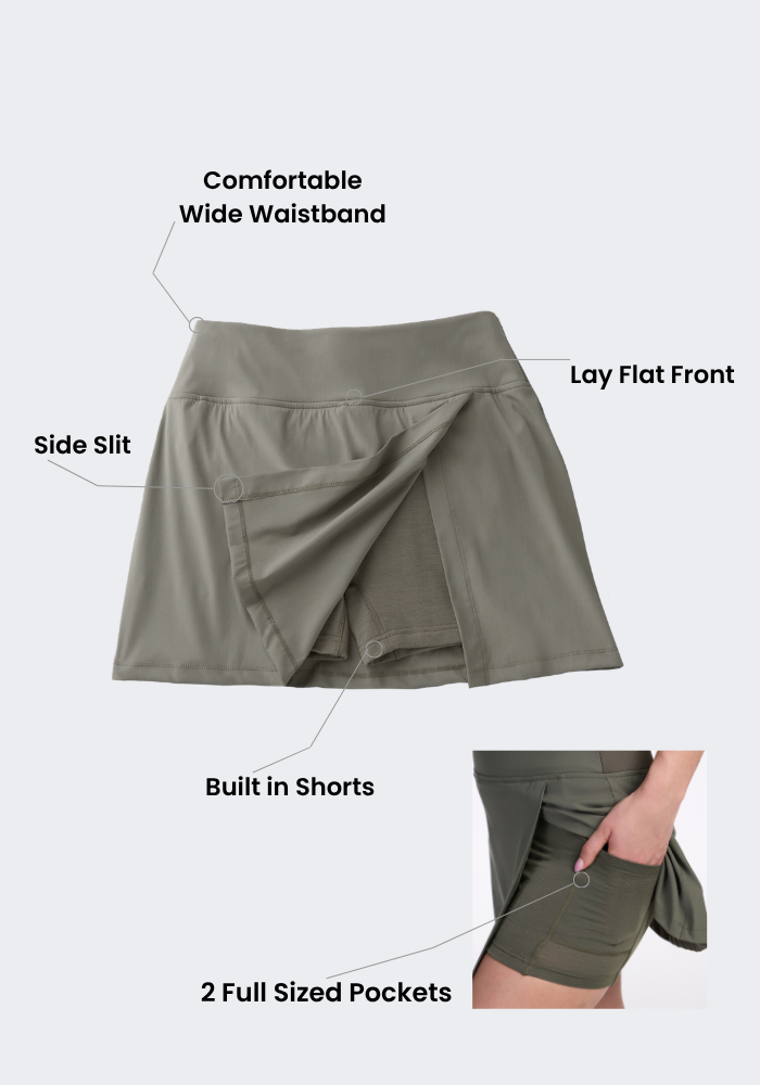Woolx Topanga Skort in olive green features a wide waistband, side slit, built-in shorts, and two roomy pockets.