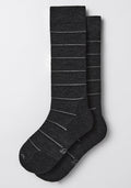 A pair of Woolx Womens Chandler Mid Calf Socks in dark grey charcoal, featuring a Merino wool blend and light gray stripes, laid flat on a light background.