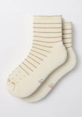 The Woolx Womens Derby Roll Top Sock in Sand Dollar features a cream color with thin, light brown stripes and small brown toe dots, shown laid flat on a white background.