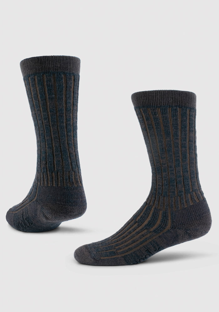 Woolx Mens Joey Mid Calf Socks in Dark Espresso, made from merino wool, are shown on a light background. One sock stands upright and the other is slightly tilted.