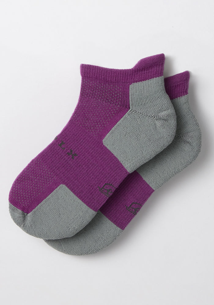 Woolx Womens Rowan No Show Socks in Purple Wine, featuring cushioned ankle support with purple tops and gray heels, toes, and soles, displayed on a white background.